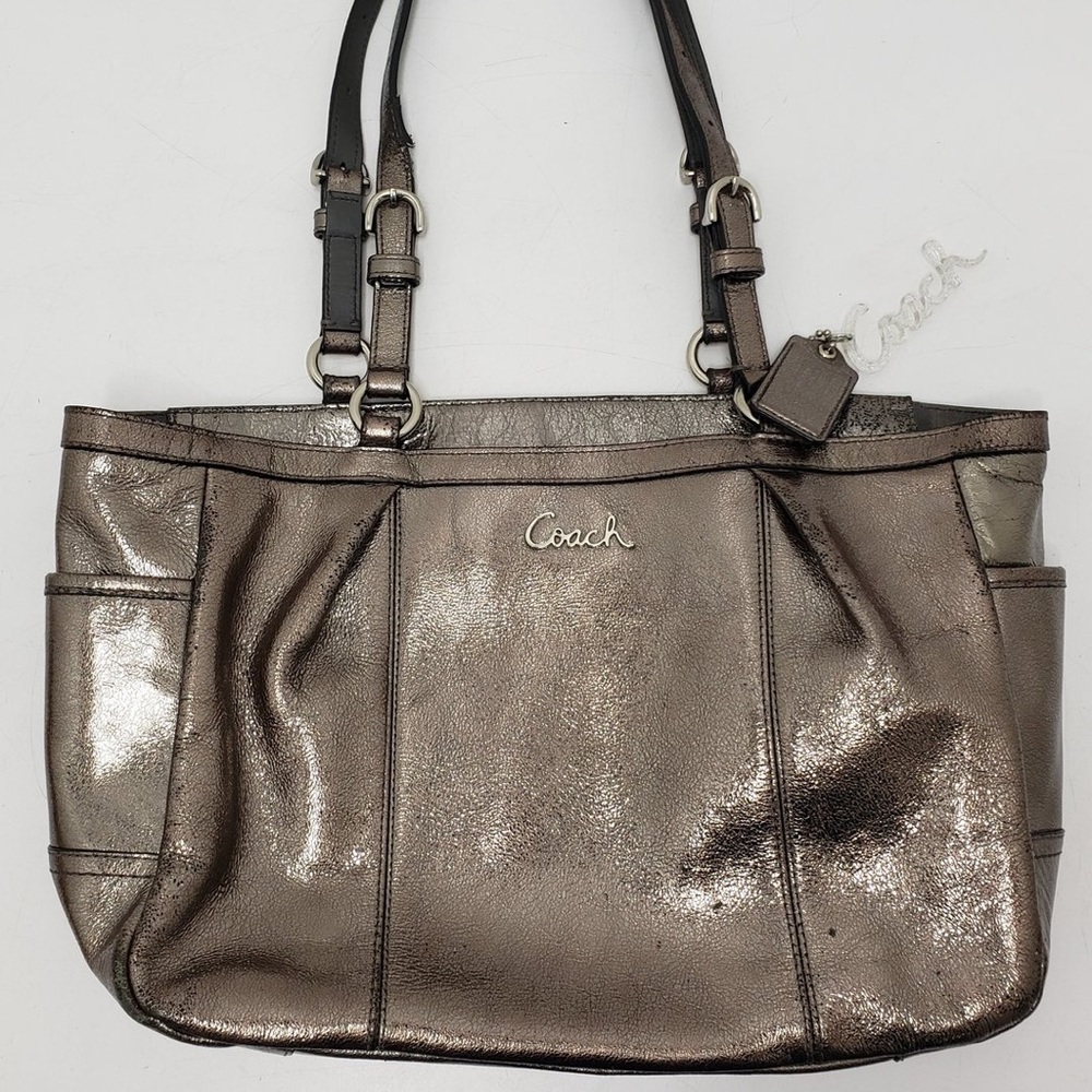 Woman’s coach purse handbag metallic